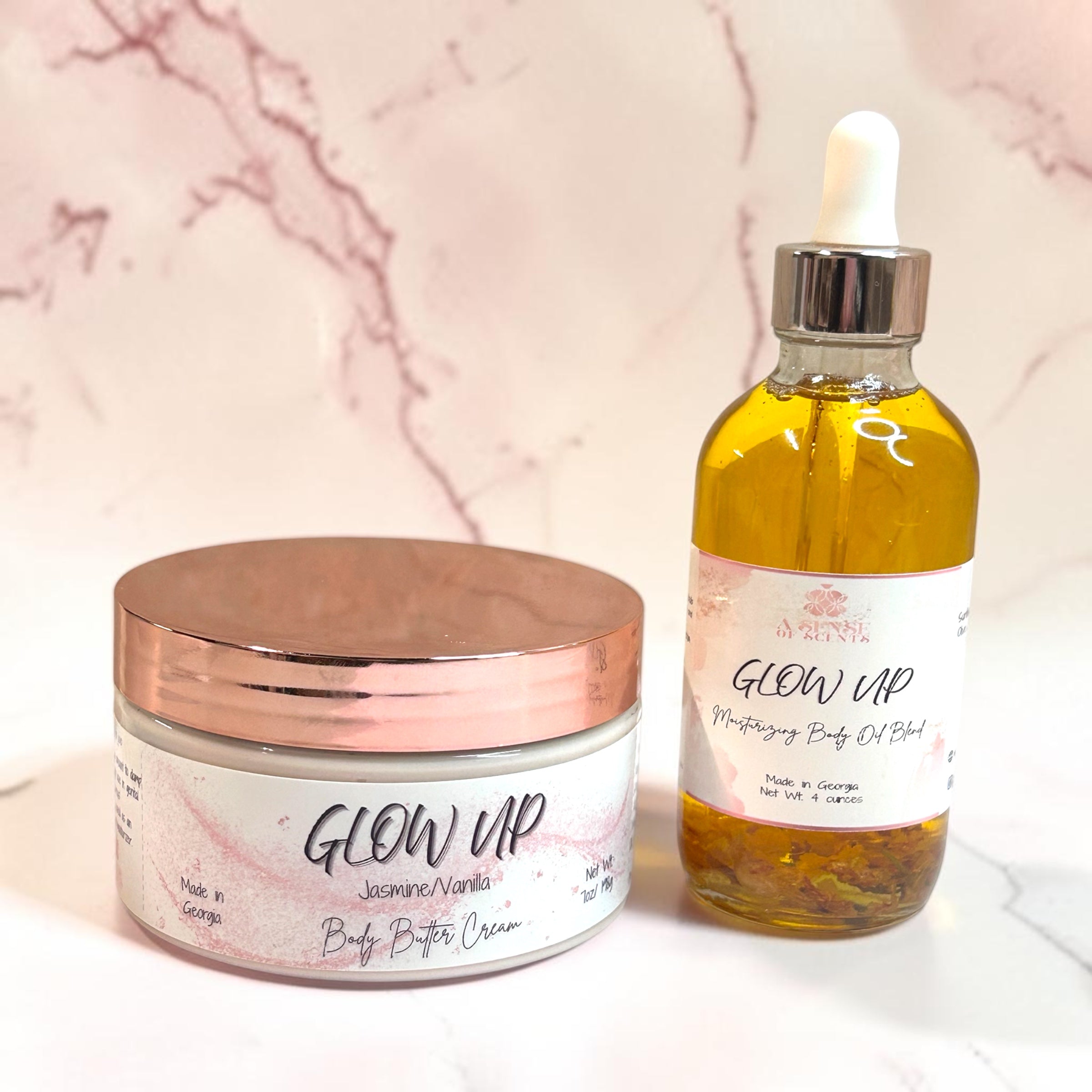 Jar of 'Glow Up' body butter cream with a rose gold lid on a wooden surface.